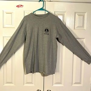 I’m selling a long sleeve vans off the wall shirt.